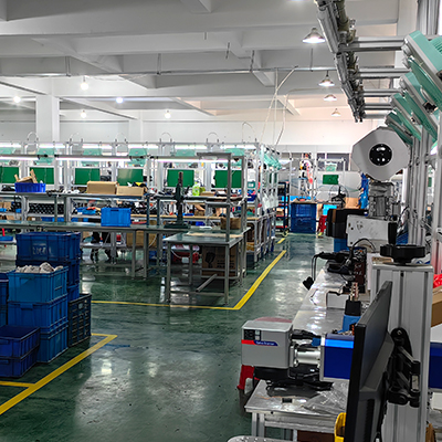 Interior view of a well-organized factory floor with various polishing machines and equipment, showcasing a range of car polisher options including dual action and rotary models.